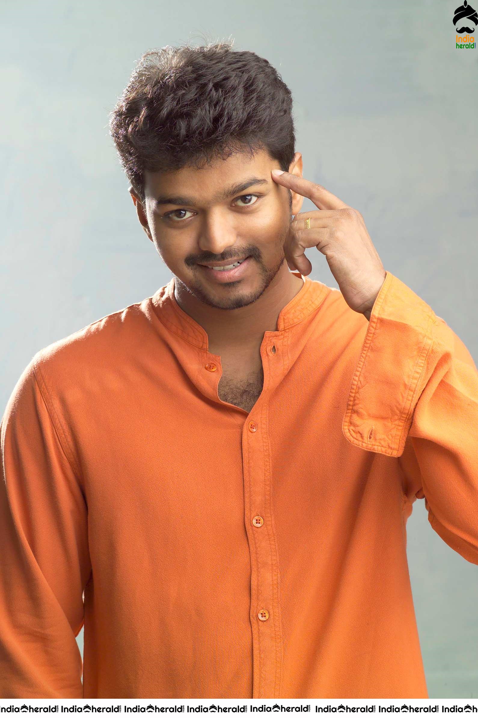 Actor Vijay Unseen Cute Photoshoot Stills in Orange Tee