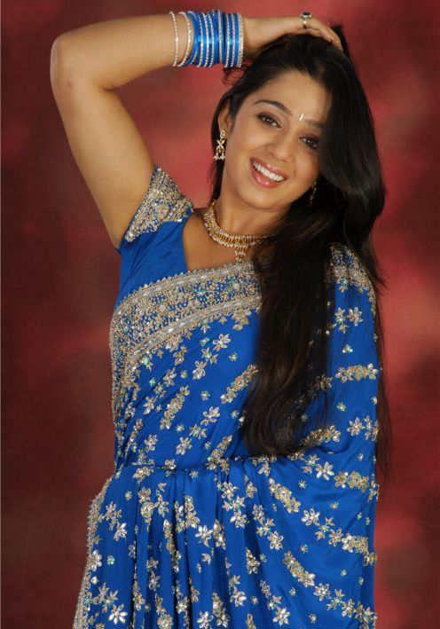 Cute And Beautiful Saree Stills Of Heroine Charmi Kaur