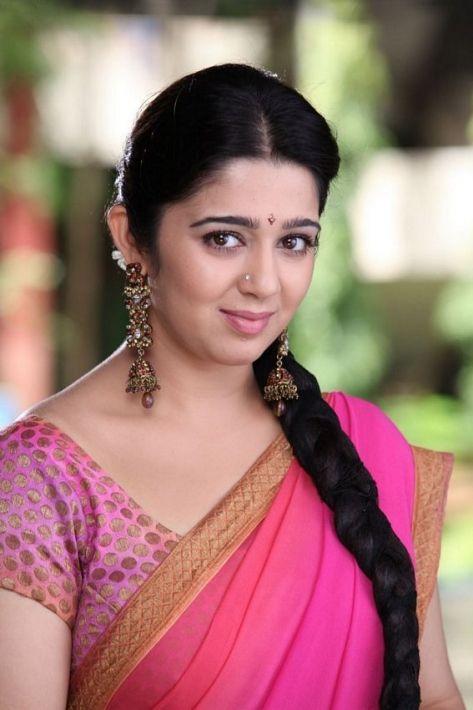 Cute And Beautiful Saree Stills Of Heroine Charmi Kaur