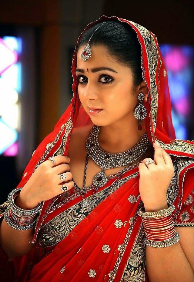 Cute And Beautiful Saree Stills Of Heroine Charmi Kaur