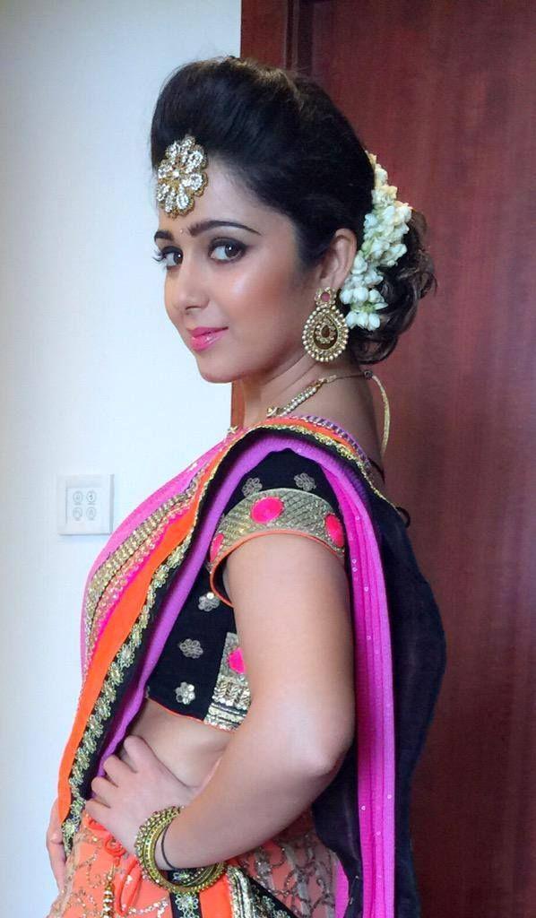 Cute And Beautiful Saree Stills Of Heroine Charmi Kaur