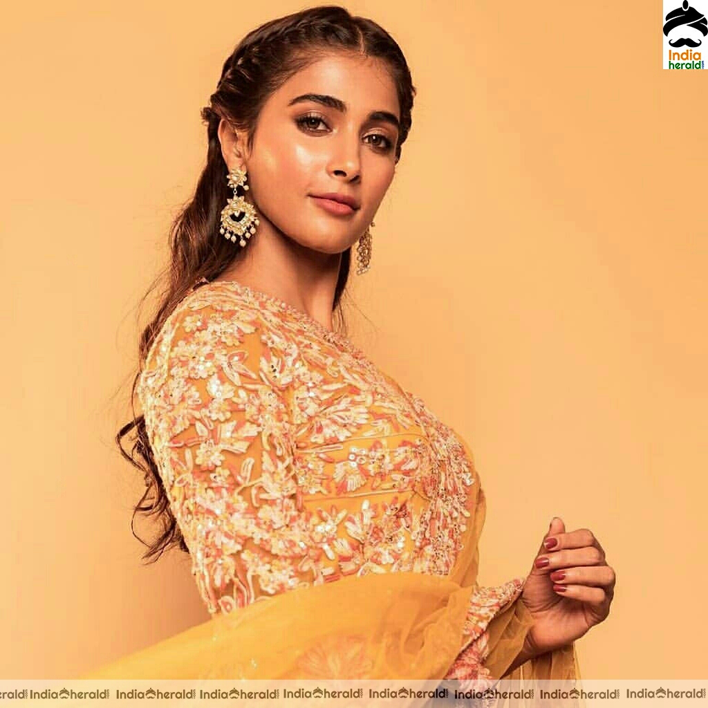 Actress Pooja Hegde Stills Looking Like A Sunflower In Mani