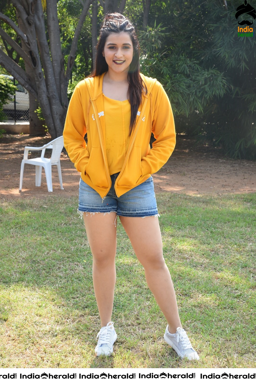 Mannara Chopra Hot Thighs Show in Sexy Shorts and Yellow Je