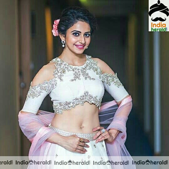 Rakul Preet Showing Her Milky Midriff And Tempting Navel In