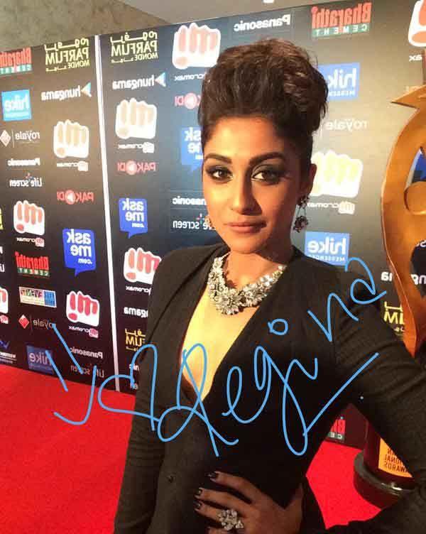 Celebs Signature Stills At SIIMA Awards 2015