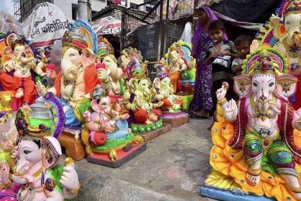 Ganesh Idol making from Clay soil Photos