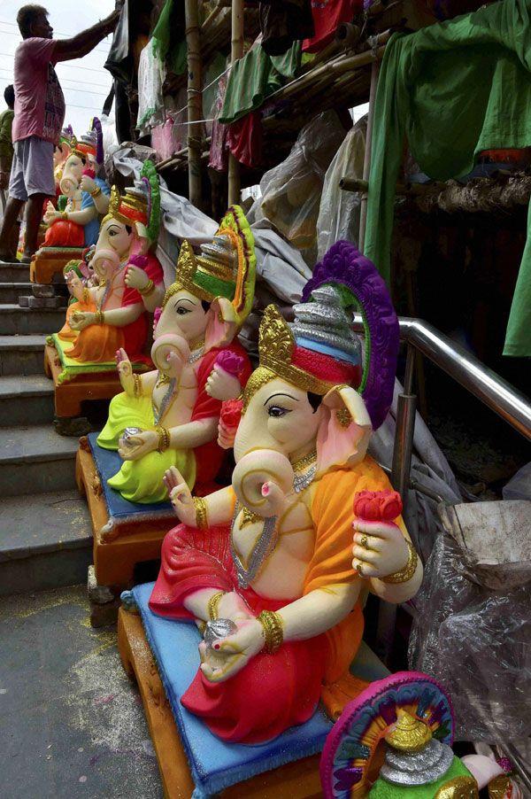 Ganesh Idol making from Clay soil Photos