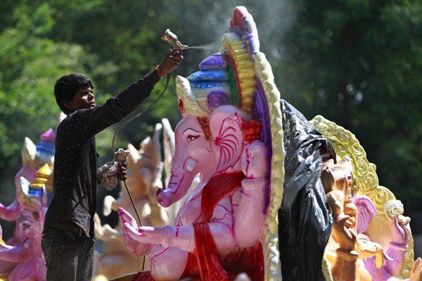 Ganesh Idol making from Clay soil Photos