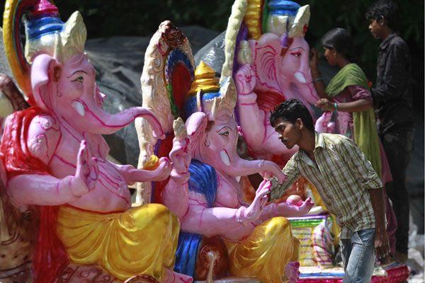 Ganesh Idol making from Clay soil Photos