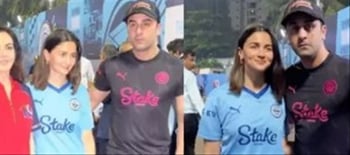 Alia, Ranbir wear number '8' T-shirts, hold hands as they walk, pose with  Nita