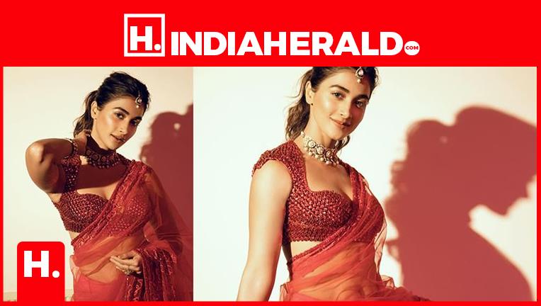 Pooja Hegde is spicing things up in red sheer saree this festive